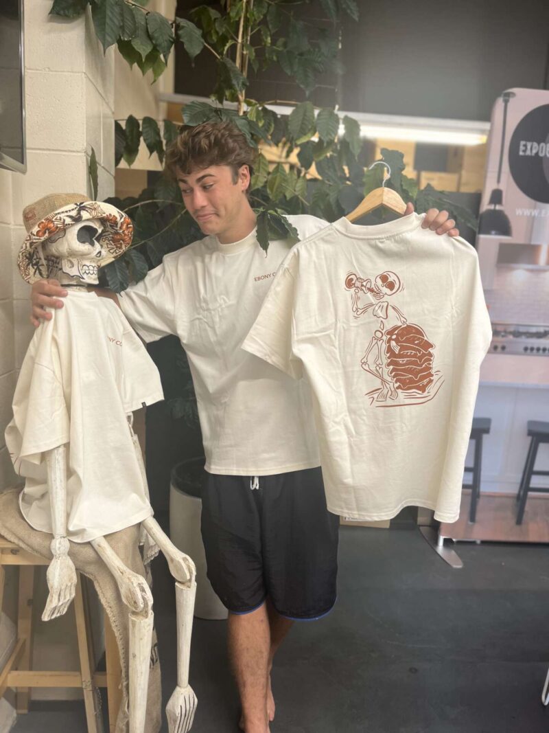 Mr E Bony meets Isaac, teeshirt illustrator